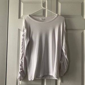 White Long Sleeve Shirt with Detailing on the Sleeves